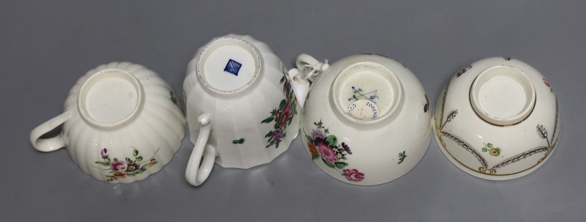 A Worcester tall faceted chocolate cup painted with flowers, a Worcester teacup, purchased Bonhams Zorensky col. part 2 Lot 105, and another Worcester teacup and teabowl